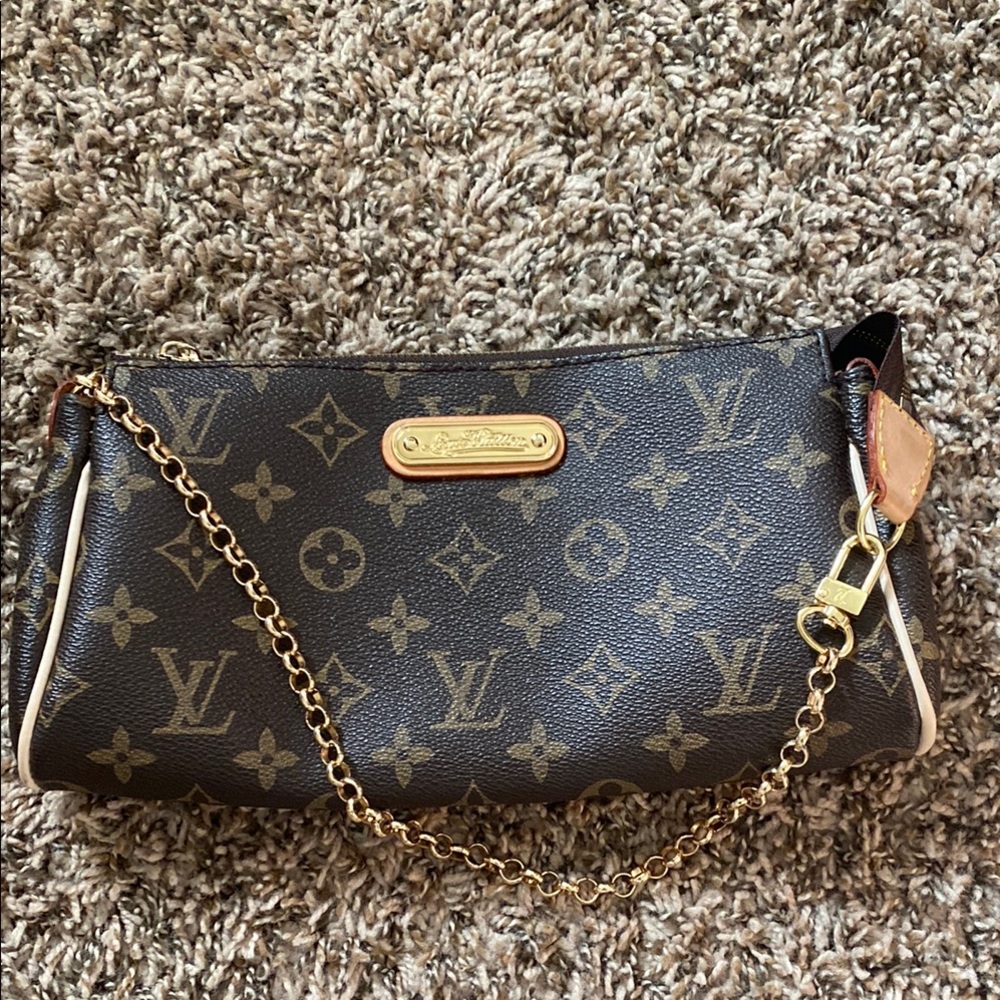 Louis Vuitton Black and Gold Monogram Wristlet